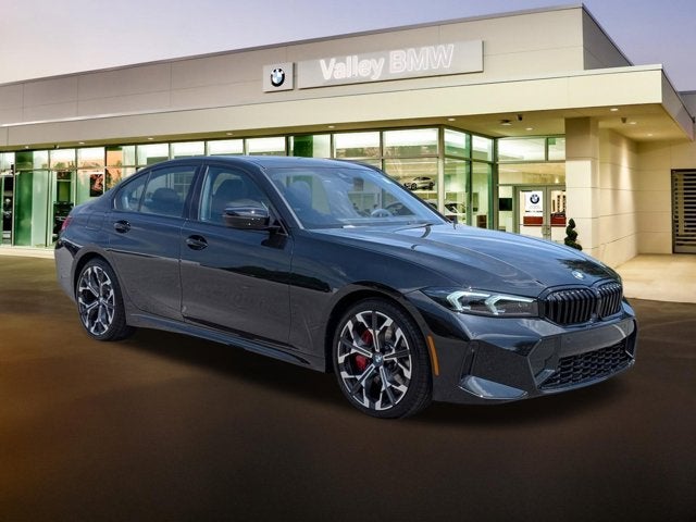 2026 BMW 3 Series 330i NA in Black Sapphire Metallic — front three-quarter view
