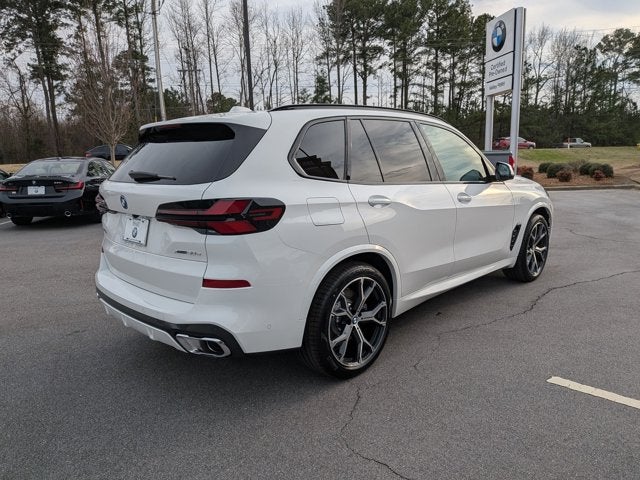 2026 BMW X5 — rear three-quarter view