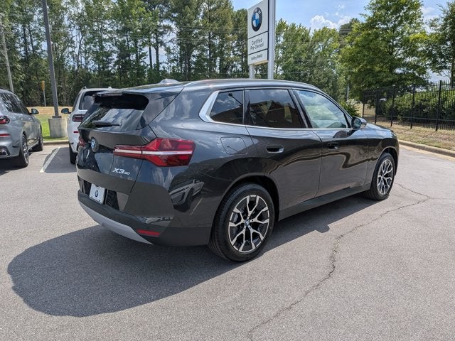2026 BMW X3 — rear three-quarter view