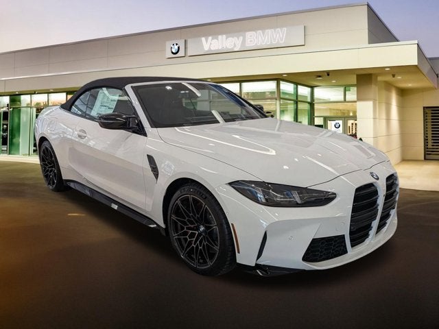 2026 BMW M4 Competition xDrive in Alpine White — front three-quarter view