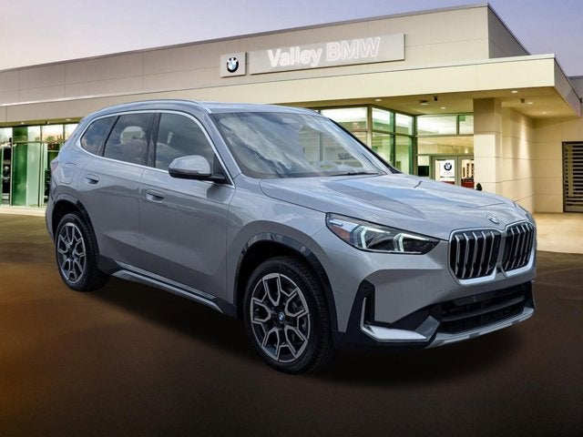 2026 BMW X1 xDrive28i in Space Silver Metallic — front three-quarter view